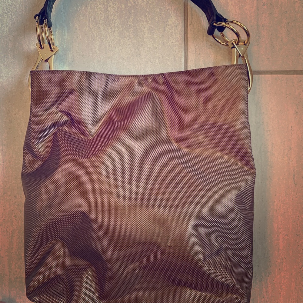 Bronze bag with black handle in great condition